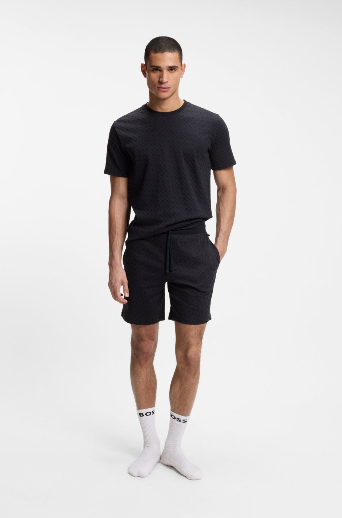 Bermudas de pijama com cinto elástico em algodão com estampa de marca