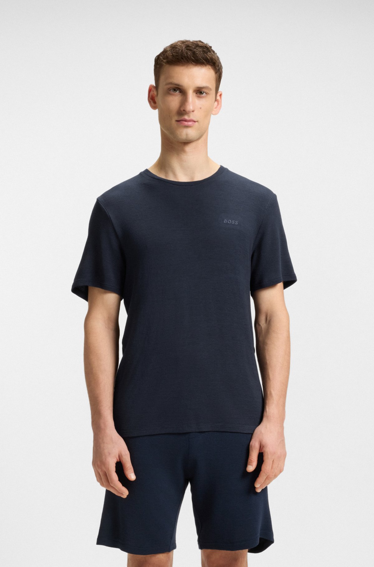 Camisola de pijama com logotipo bordado em malha elástica Camisola de pijama com logotipo bordado em malha elástica