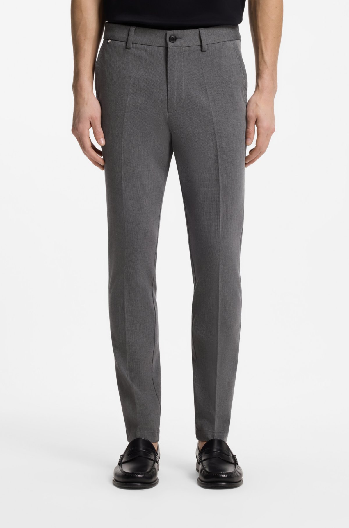 Calças slim-fit em algodão elastano com tecido dobby
