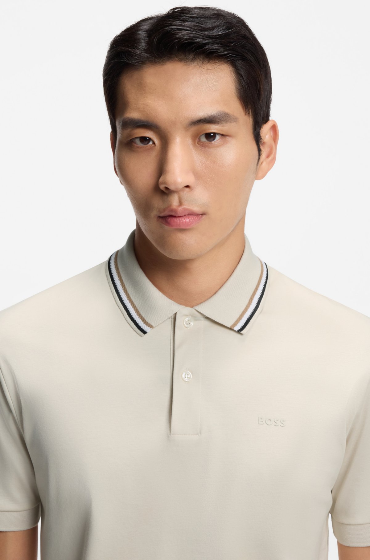 Camiseta polo slim-fit listrada de algodão com logotipo