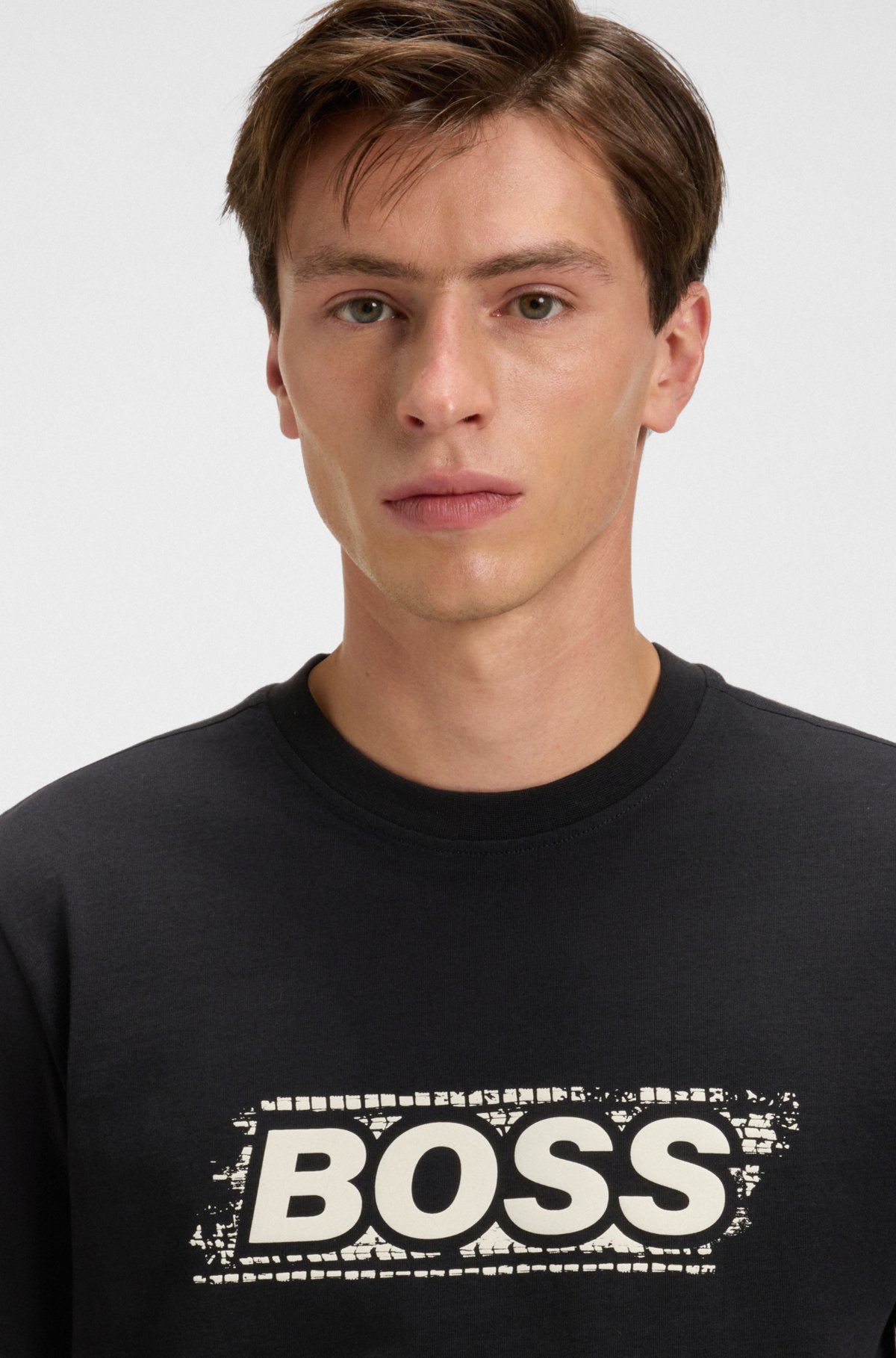 Camiseta de malha de algodão com arte gráfica do logotipo