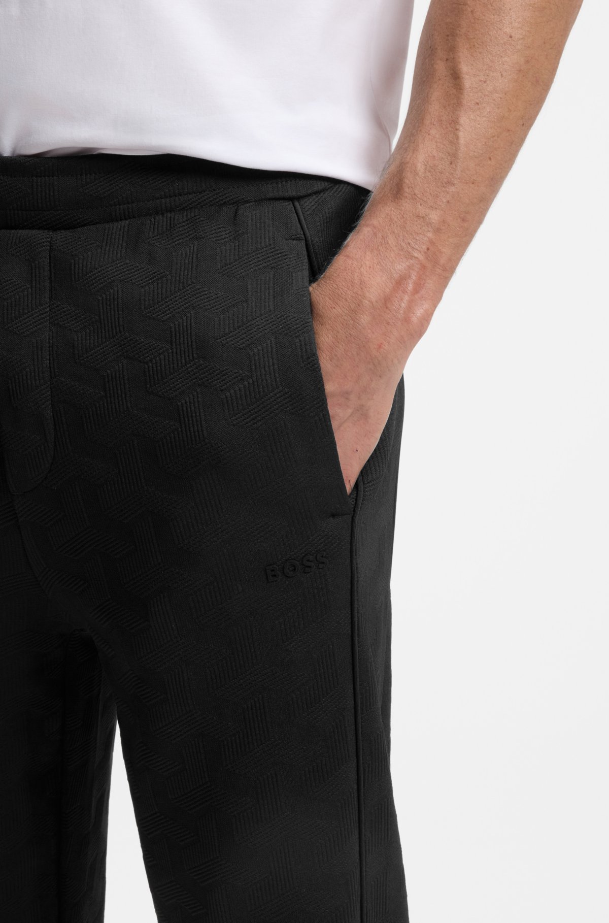 Calças de moletom com jacquard entalhado em corte regular