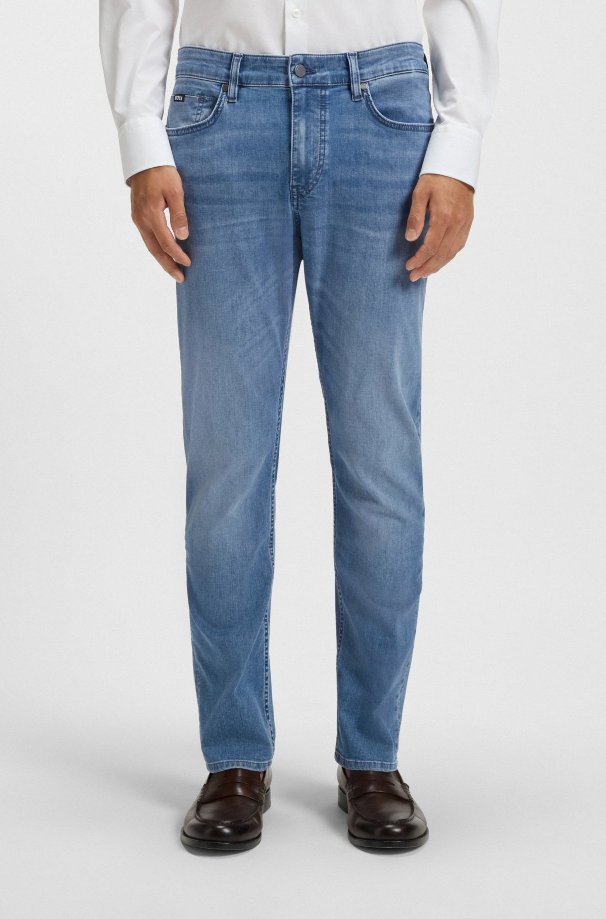Calças jeans slim azuis em denim de desempenho