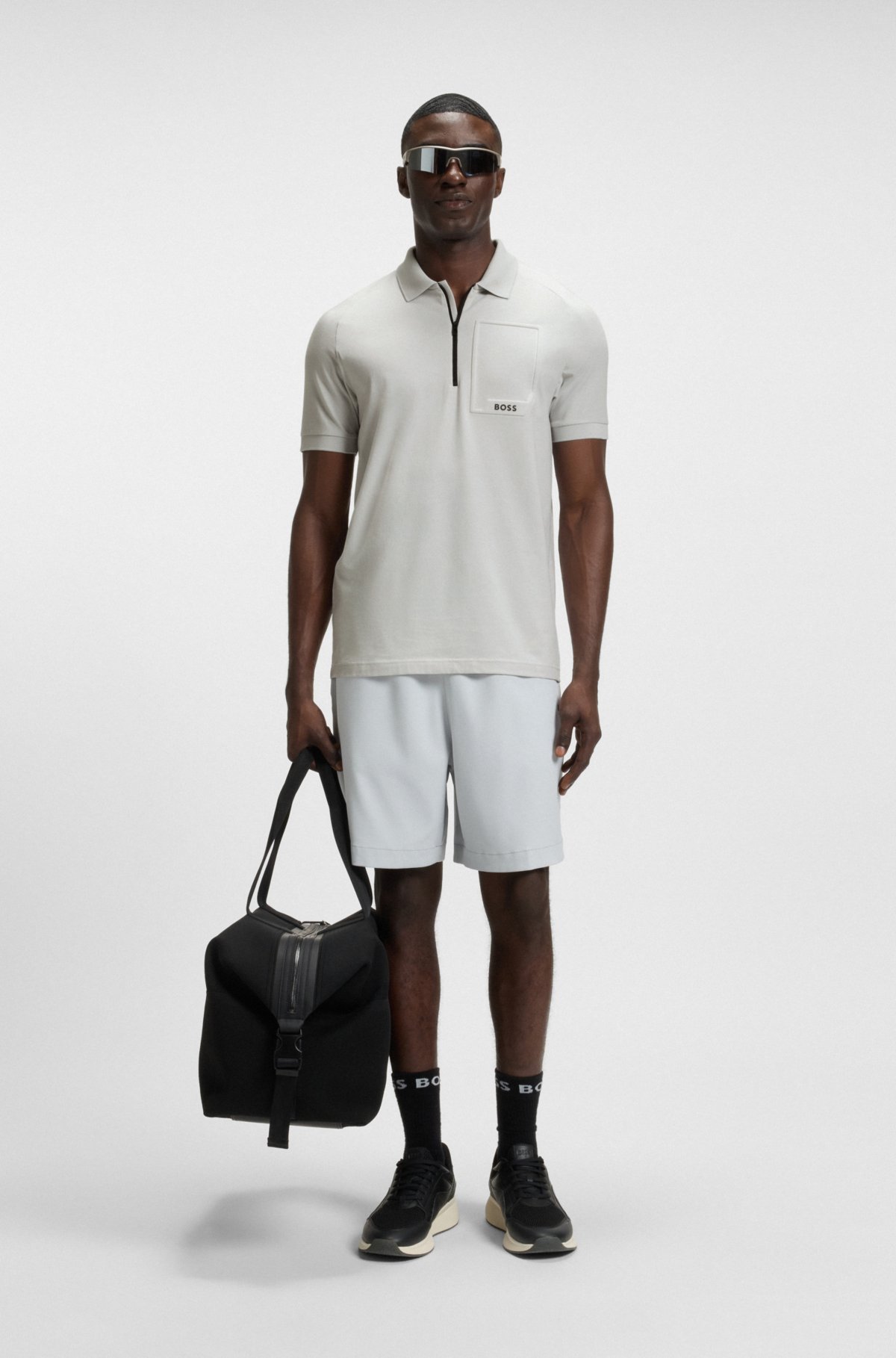 Camiseta polo com gola em zíper em tecido que elimina a umidade