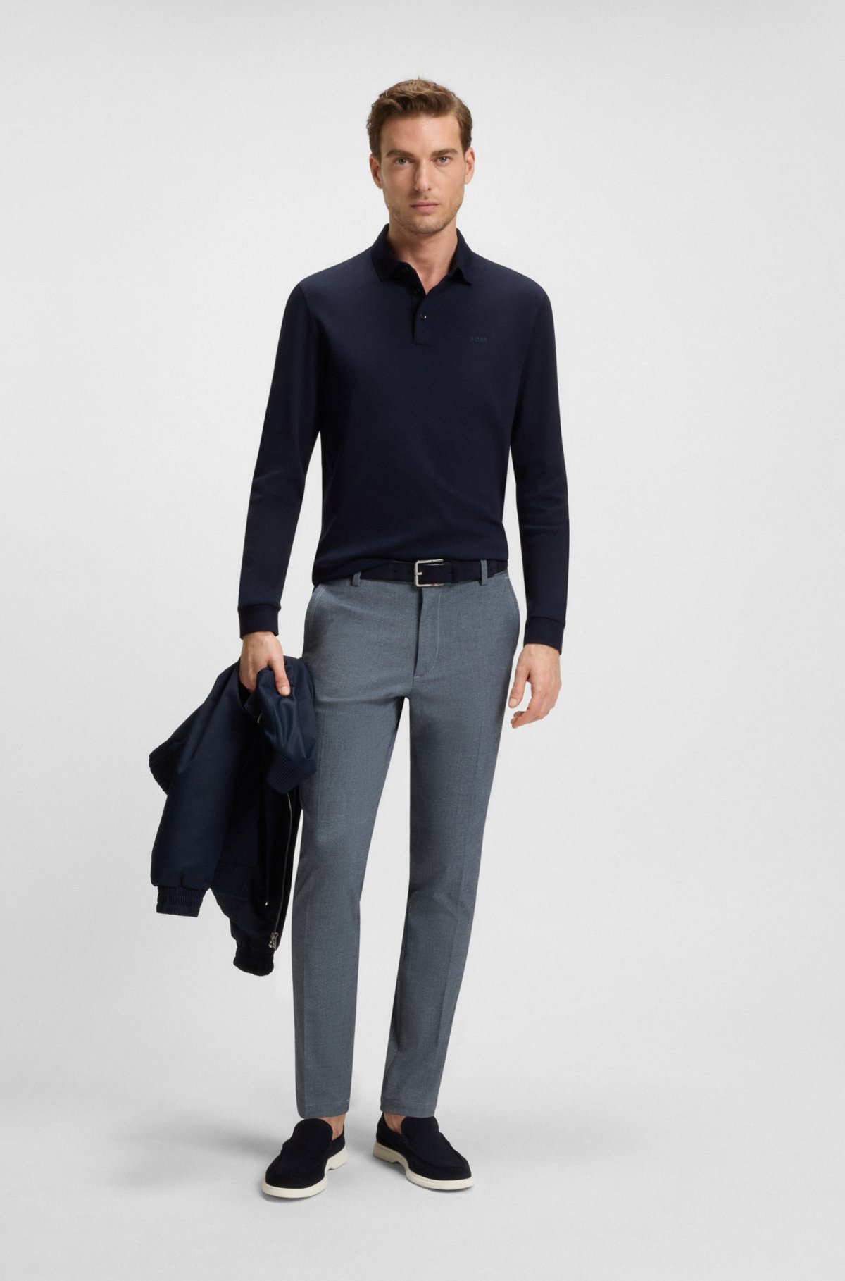 Calças masculinas slim-fit em tecido stretch com estrutura dobby
