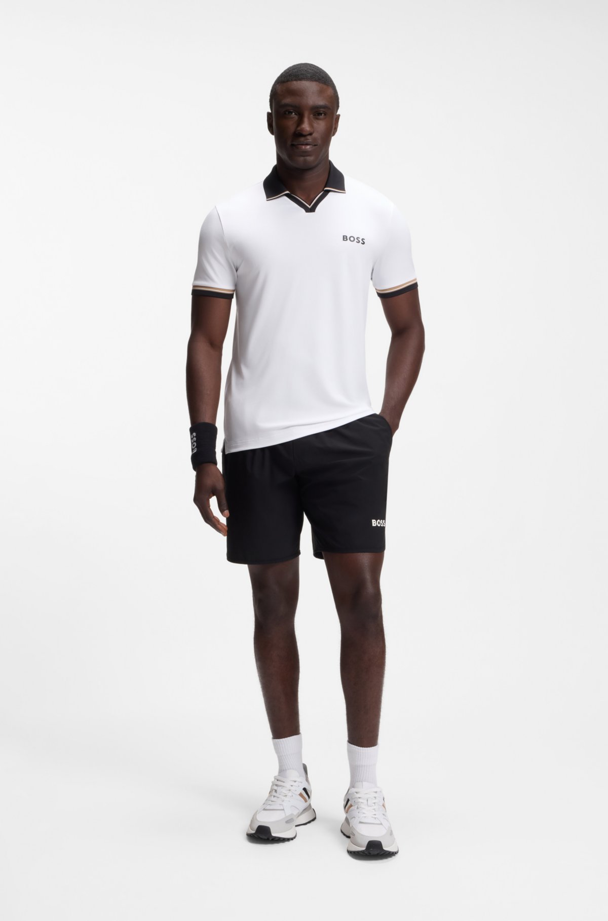 Camisa polo slim-fit ativa com detalhes de listras características
