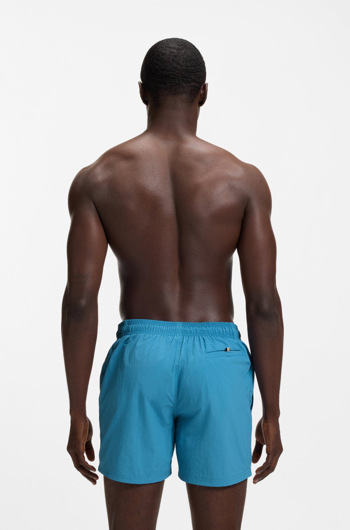 Bermudas de banho de secagem rápida com estampa vertical do logotipo