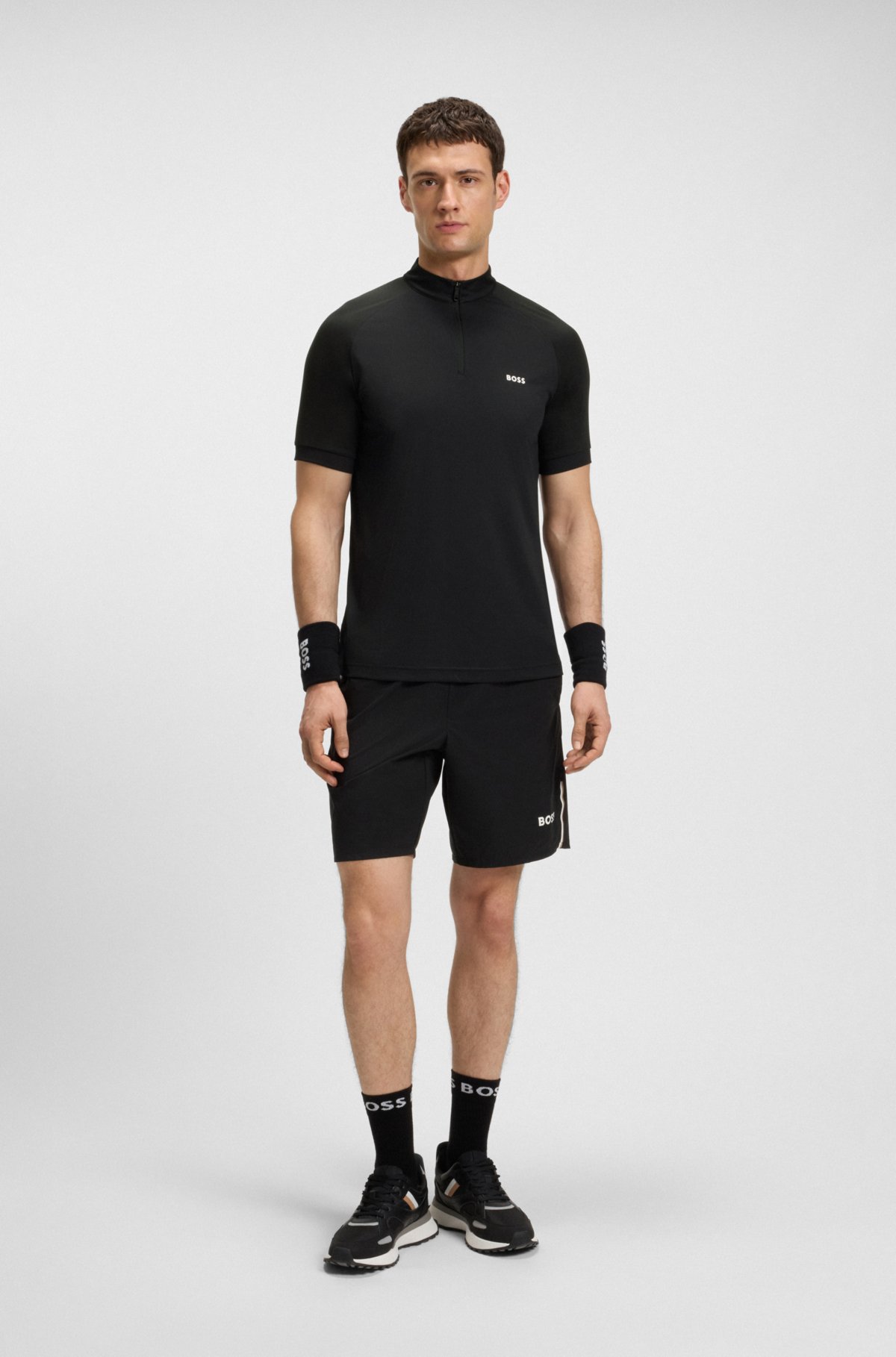 Camisa polo slim-fit de ripstop elástico com desempenho de secagem rápida