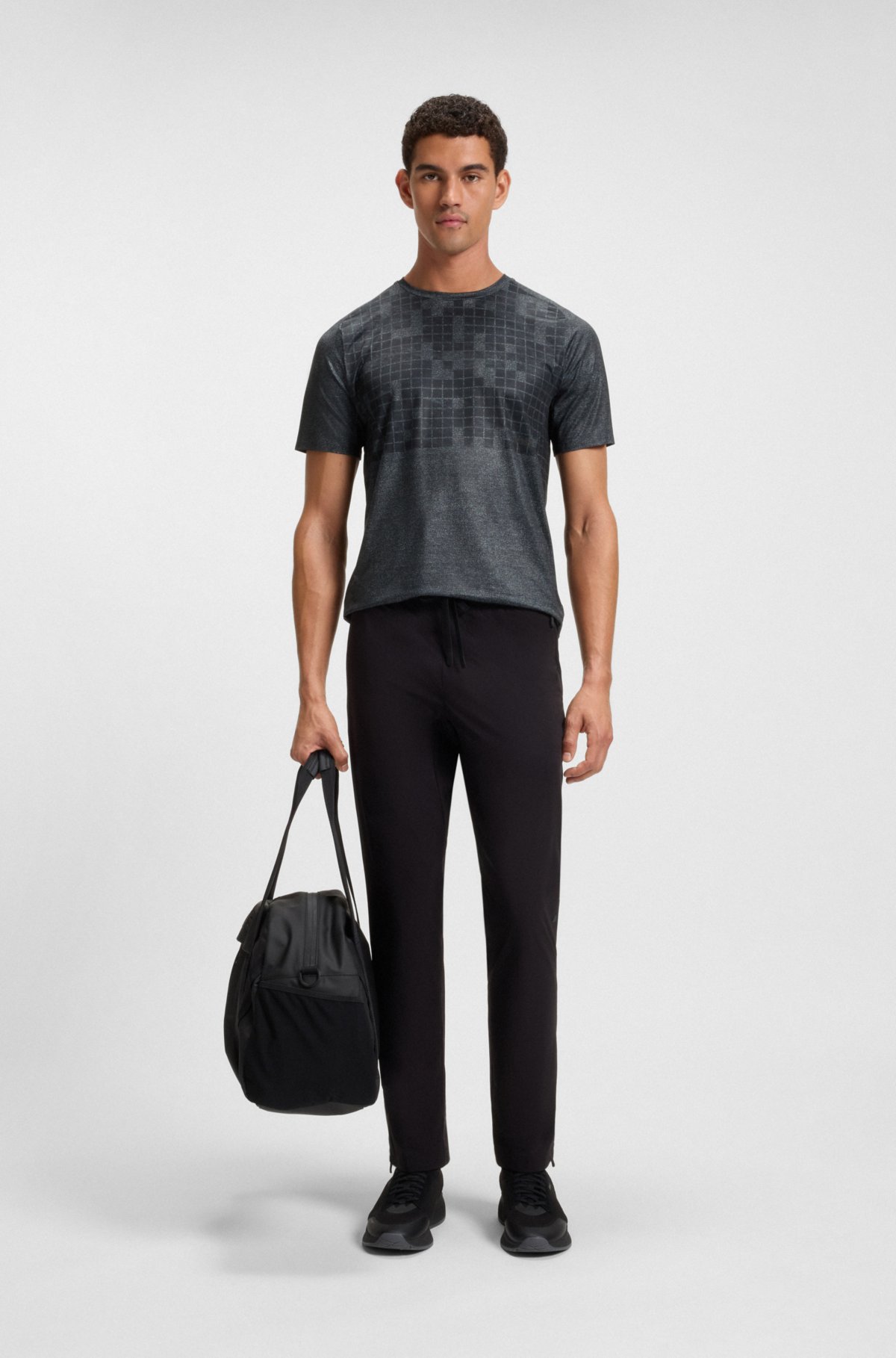 Camiseta slim-fit de malha elástica com estampa em toda a peça