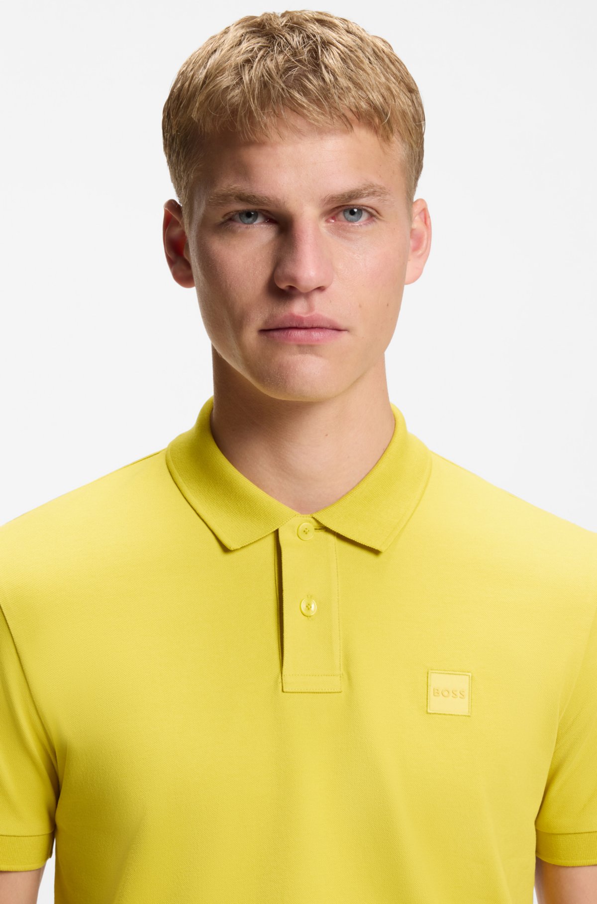 Camisa polo slim-fit de algodão elástico com patch de logotipo