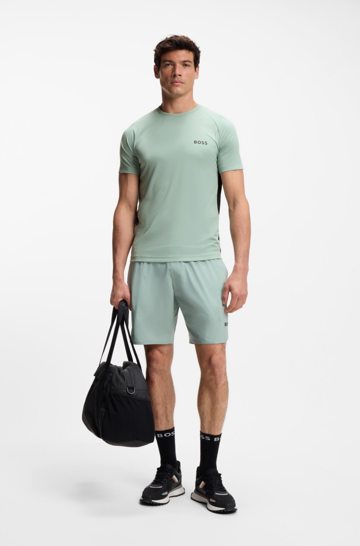 Camiseta slim-fit de secagem rápida com elasticidade em quatro direções