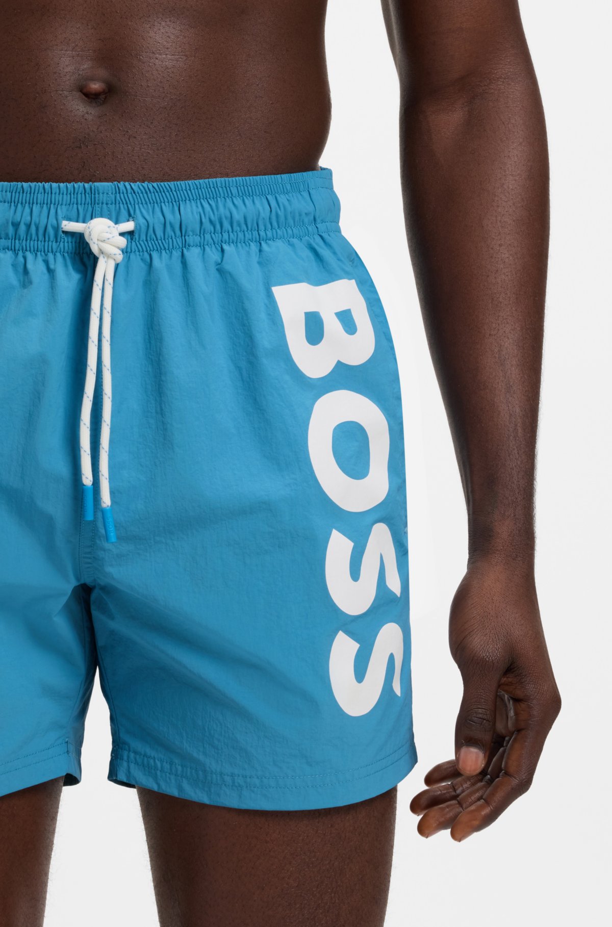 Bermudas de banho de secagem rápida com estampa vertical do logotipo