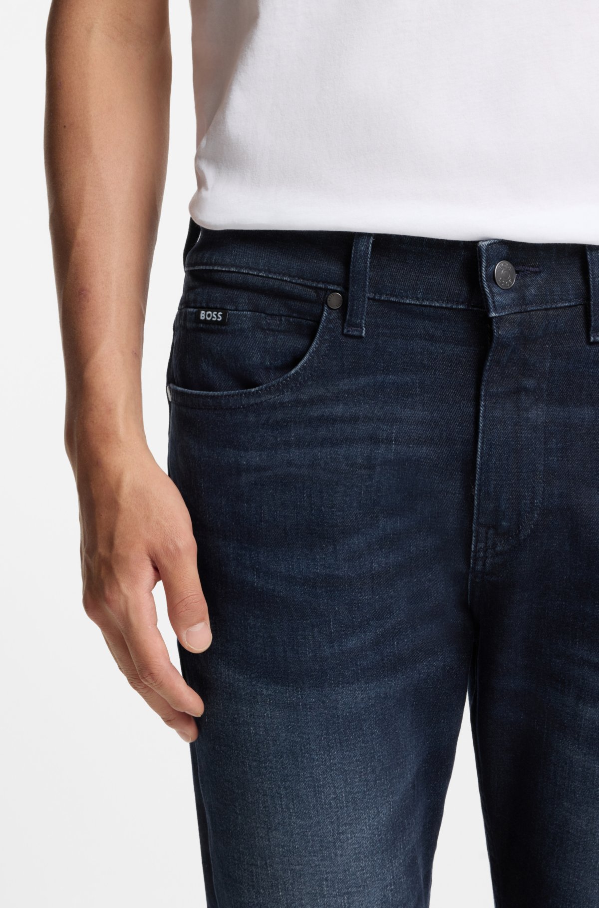 Calças jeans slim-fit em denim elástico azul-escuro