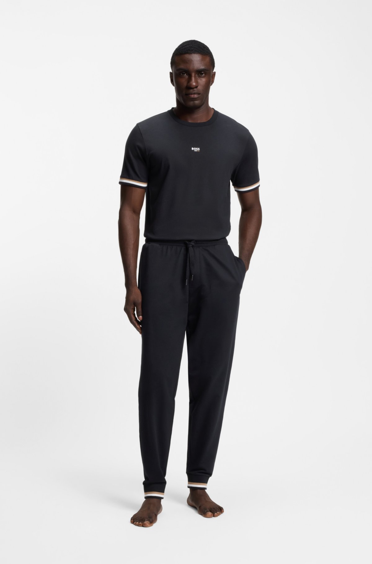 Calças de pijama em algodão-terry com listras características e logotipo