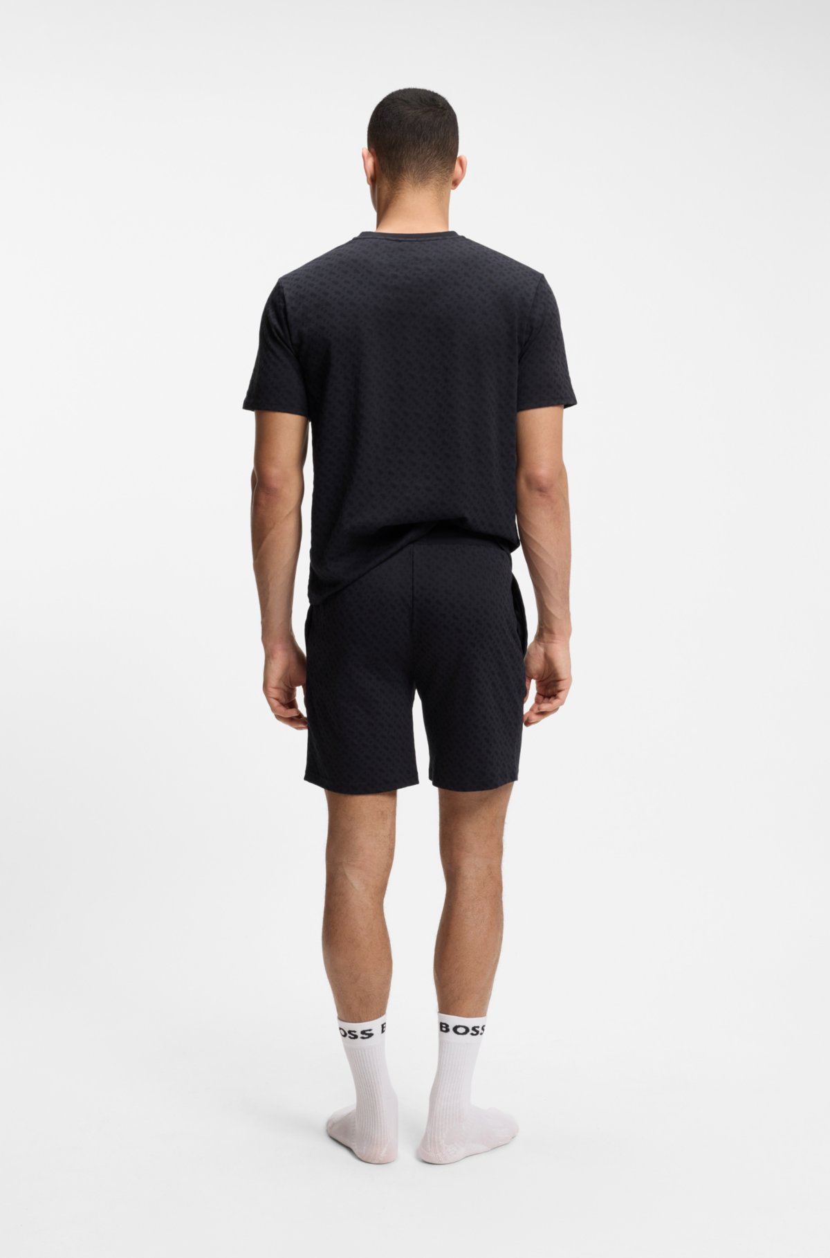 Bermudas de pijama com cinto elástico em algodão com estampa de marca