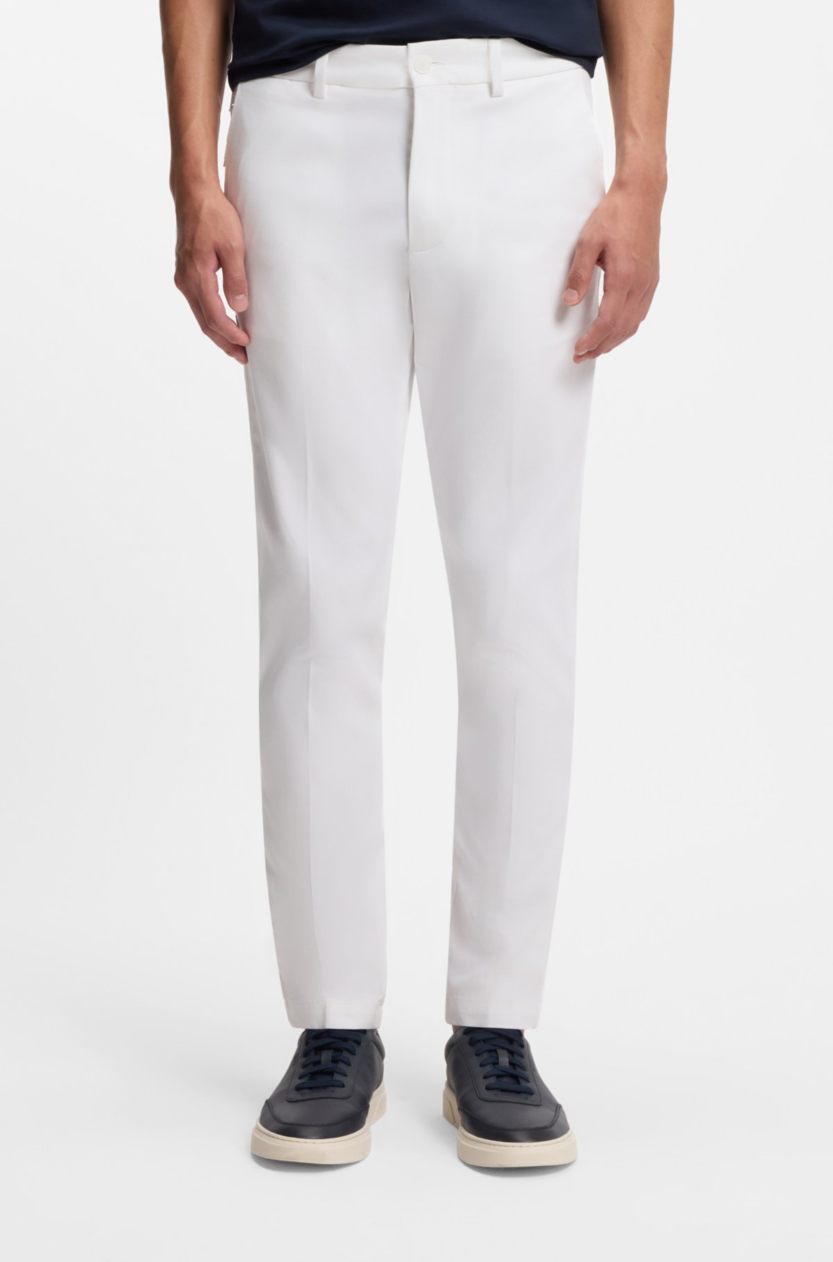 Calças slim-fit em mistura de algodão elástico